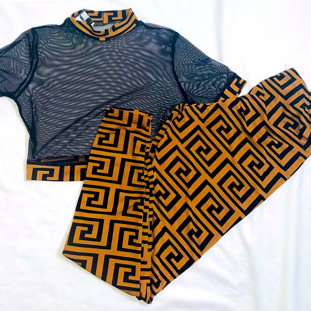 Sexy two piece, mesh top and high waist stretchy leggings.